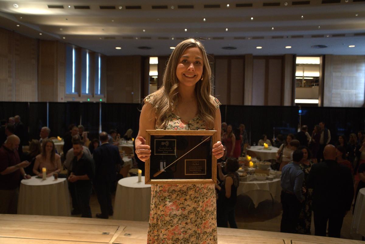 Amanda Hays, Vice President and Relationship Manager for Key Private Bank, accepts the Buffalo Philharmonic Orchestra’s 2024 Leadership in Music Education Award on behalf of KeyBank. Photo courtesy: Brett Deneve " "